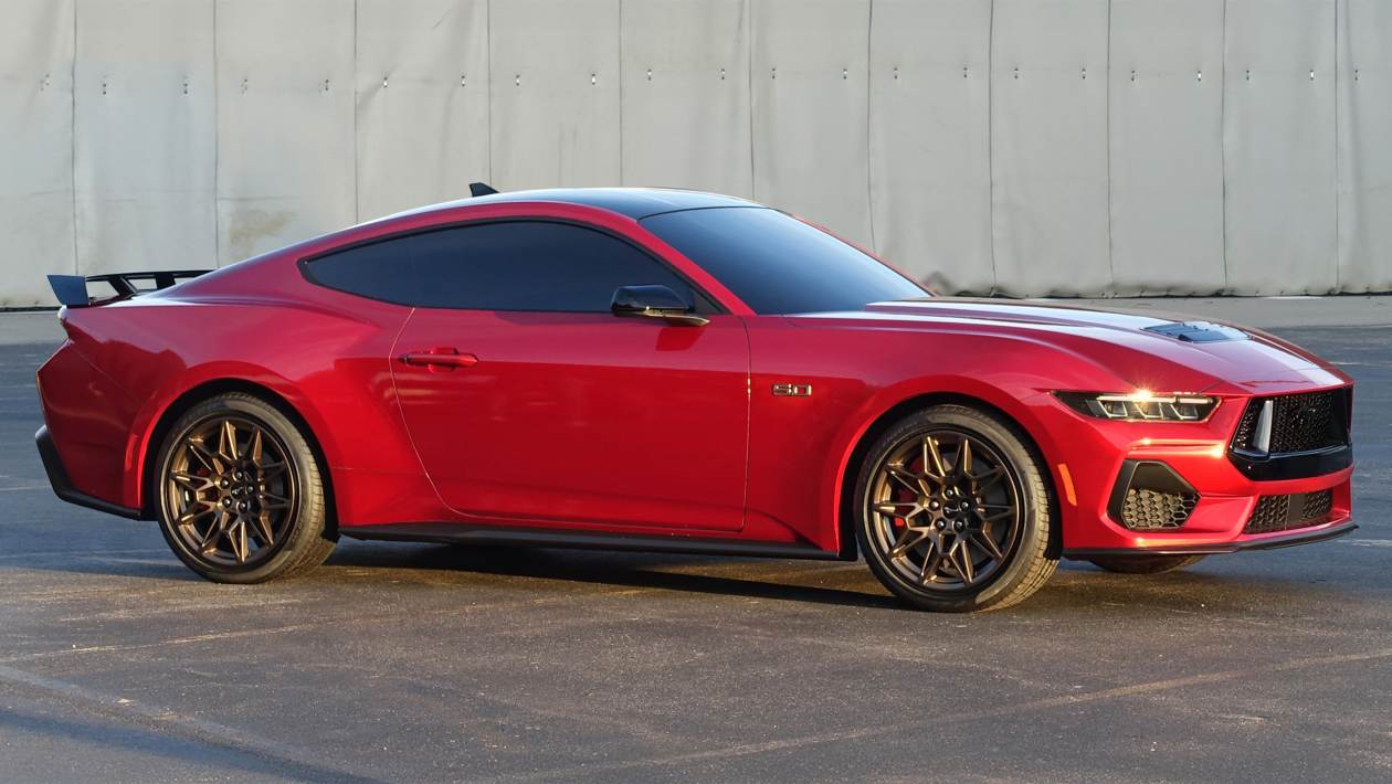 Polestar 2 connected to a wallbox charger on a driveway